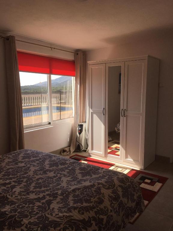 A bed or beds in a room at Espuna Walks Casa Los Arcos