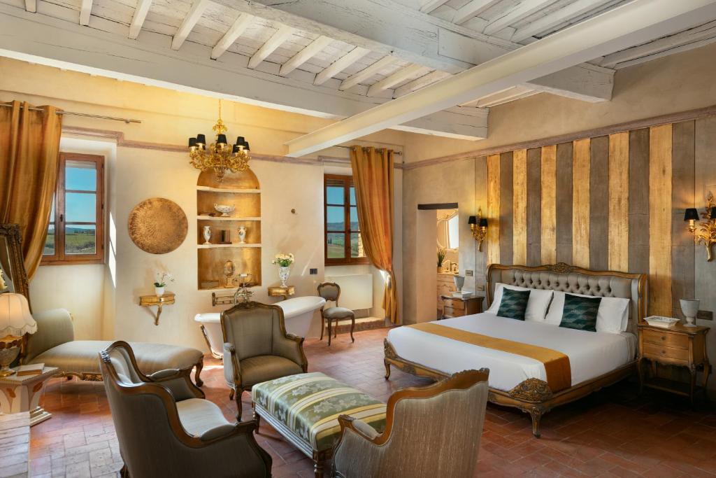 Postel nebo postele na pokoji v ubytování Il Miraggio in Val d'Orcia Relais & Spa