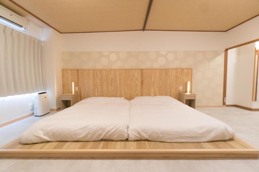 Postel nebo postele na pokoji v ubytování VOYAN Resort Fujiyamanakako Gekkoso