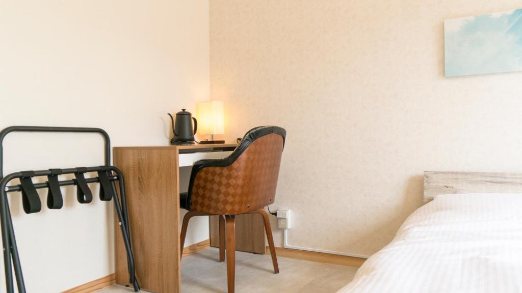 Postel nebo postele na pokoji v ubytování VOYAN Resort Fujiyamanakako Gekkoso