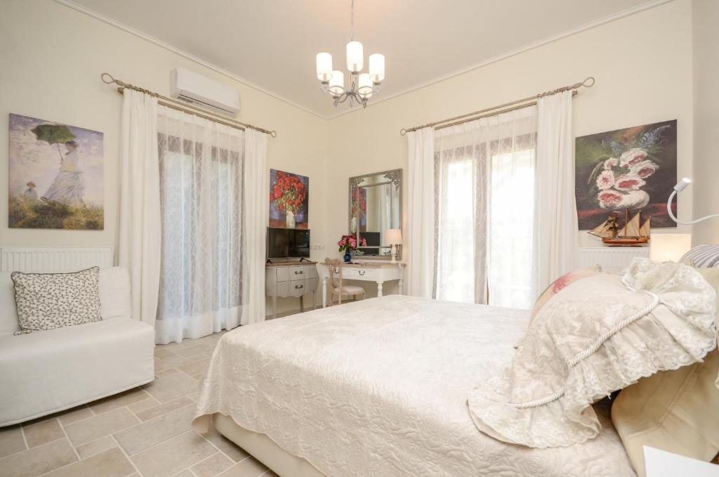 Posteľ alebo postele v izbe v ubytovaní Villa Pari Manda