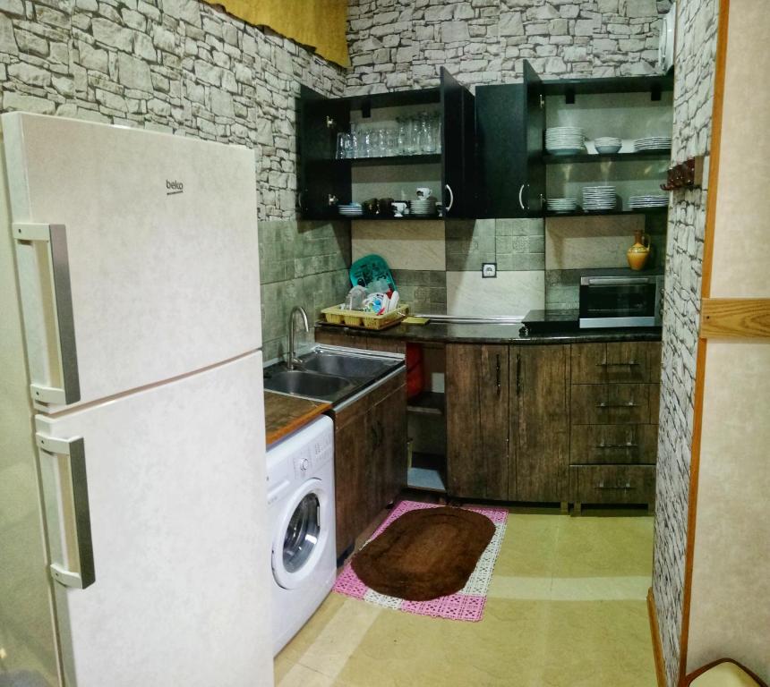 Kuchyň nebo kuchyňský kout v ubytování Hostel Violet