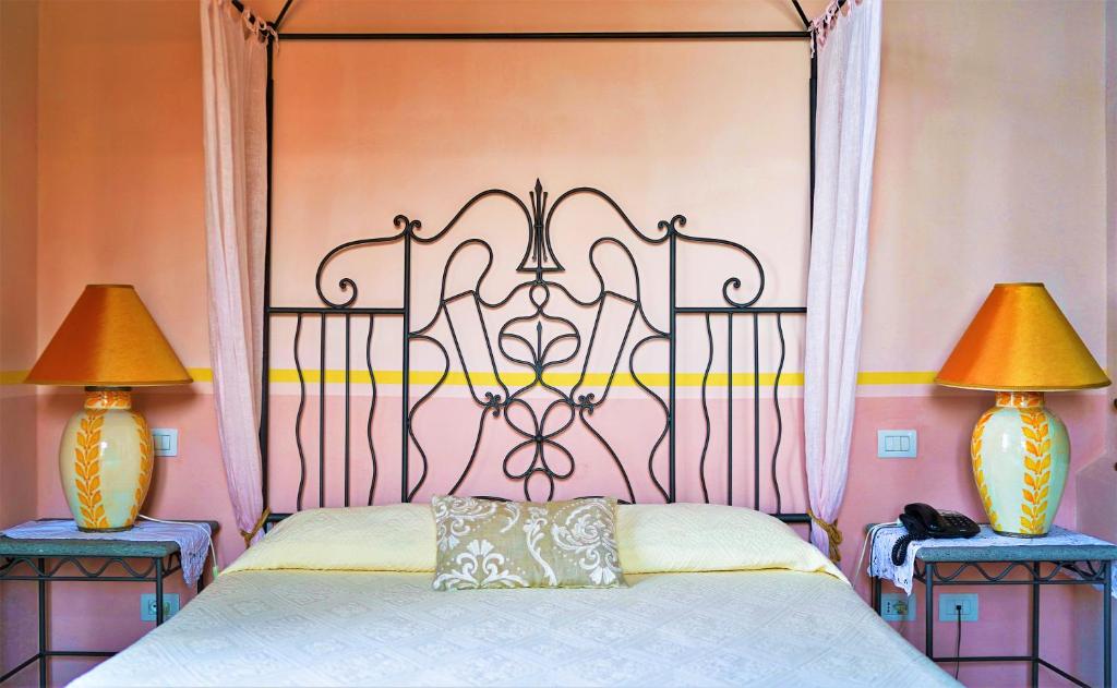 Postel nebo postele na pokoji v ubytování Marulivo Hotel