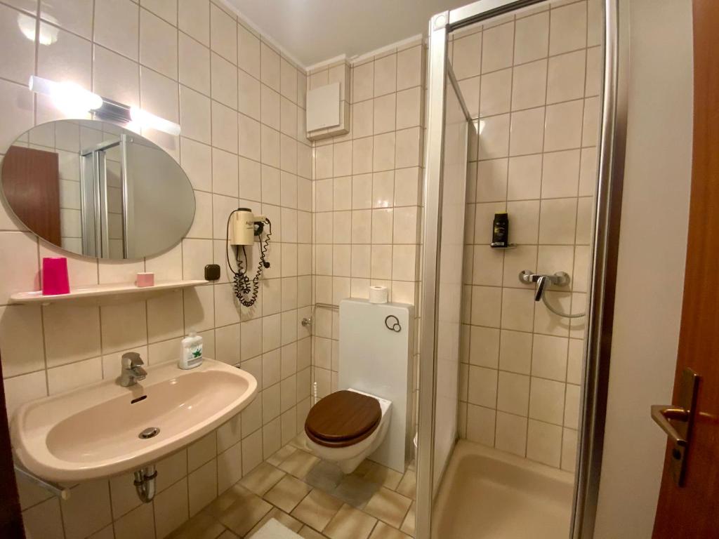 Koupelna v ubytování Hotel Attaché
