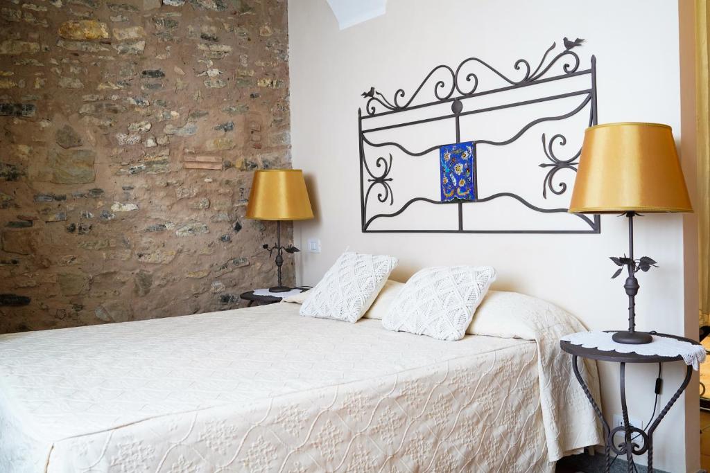Postel nebo postele na pokoji v ubytování Marulivo Hotel