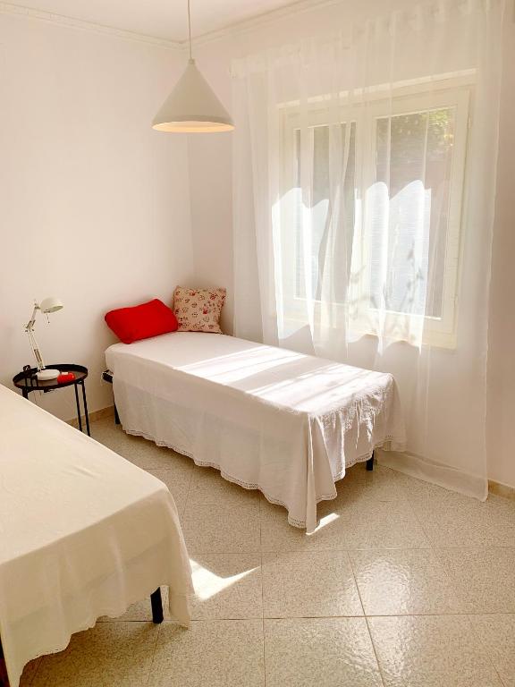 Piana Apartment a Carloforte - Incantevole casa con patio