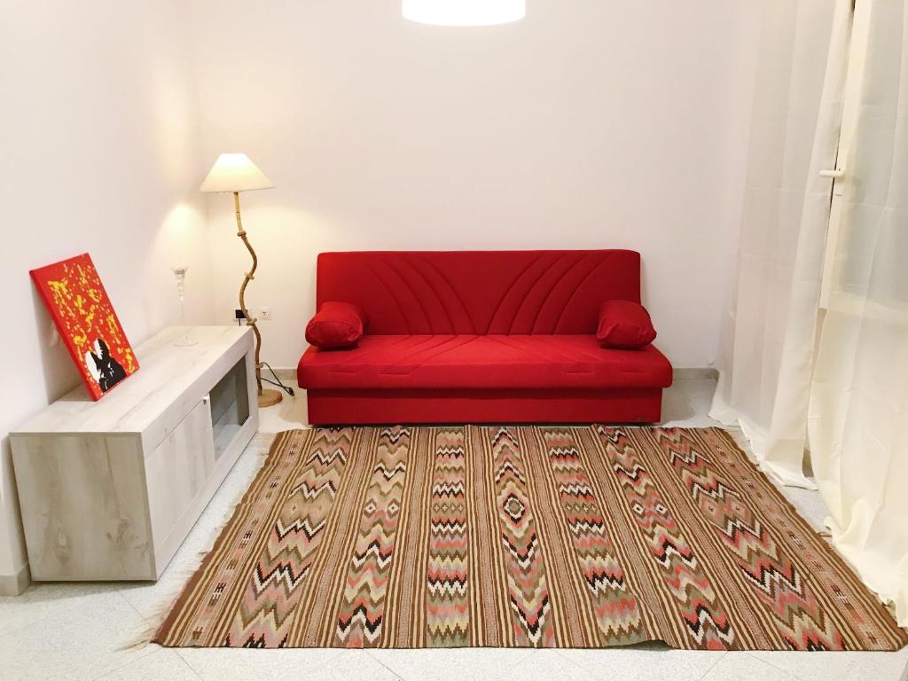 Ruang duduk di Piana Apartment