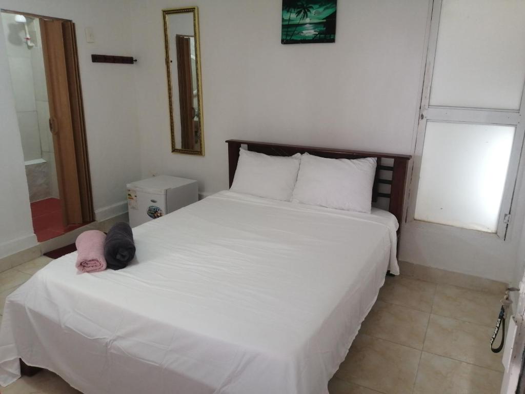 Postel nebo postele na pokoji v ubytování Inn Skyline Hostel