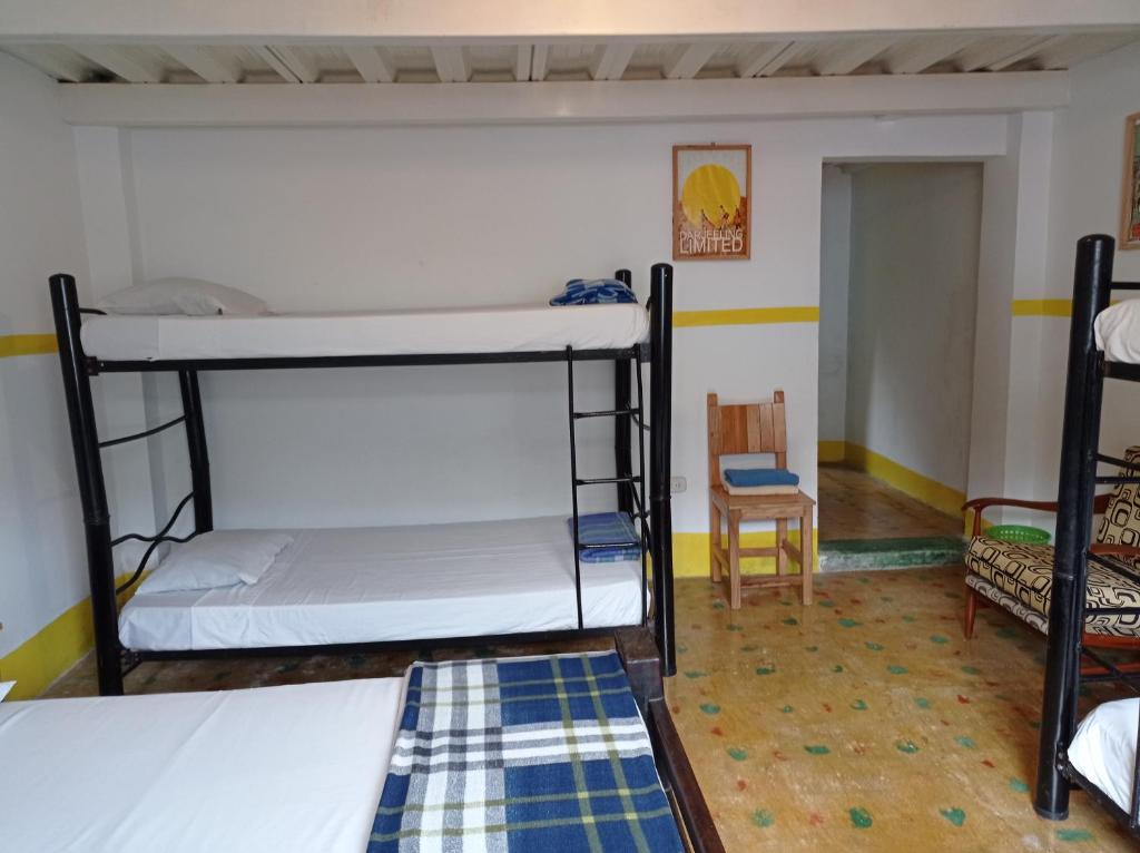 Letto o letti in una camera di Bidea Backpackers Hostel