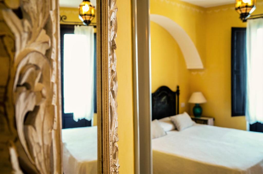 Postel nebo postele na pokoji v ubytování Marulivo Hotel