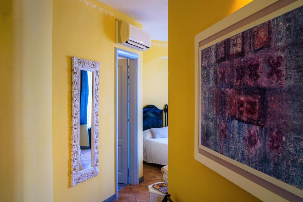 Postel nebo postele na pokoji v ubytování Marulivo Hotel