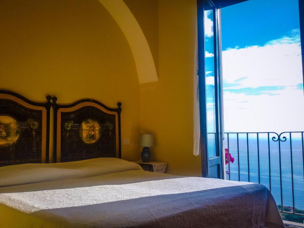 Postel nebo postele na pokoji v ubytování Marulivo Hotel