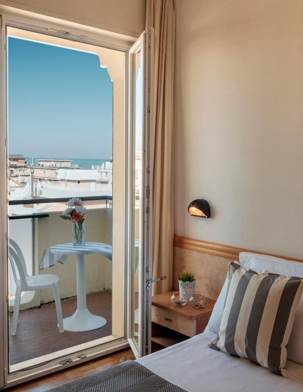 Postel nebo postele na pokoji v ubytování Hotel Oceanic
