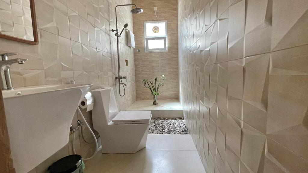 Koupelna v ubytování Fort Guesthouse نُزل القلعة
