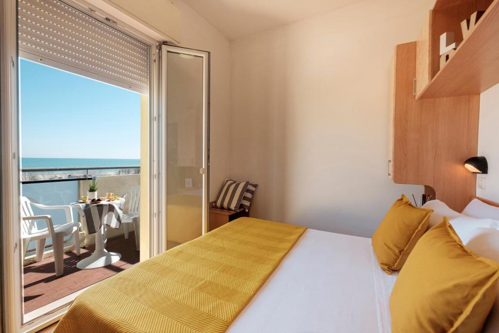 Postel nebo postele na pokoji v ubytování Hotel Oceanic