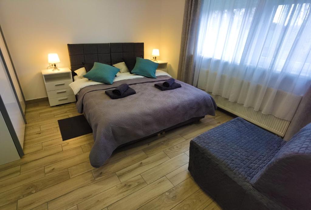 Ein Bett oder Betten in einem Zimmer der Unterkunft Apartman i studio apartman Vitana