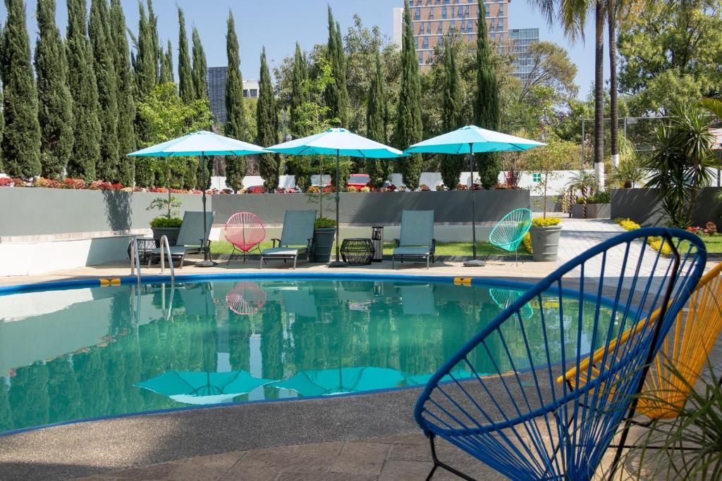 Bazén v ubytování Hotel Las Pergolas nebo v jeho okolí