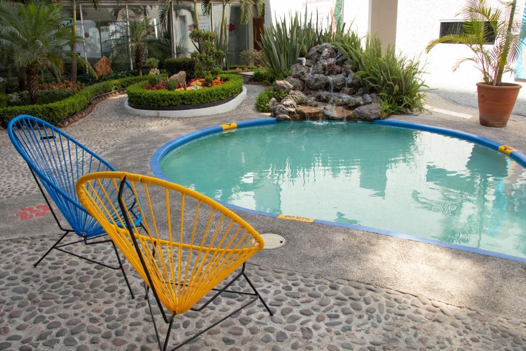 Bazén v ubytování Hotel Las Pergolas nebo v jeho okolí