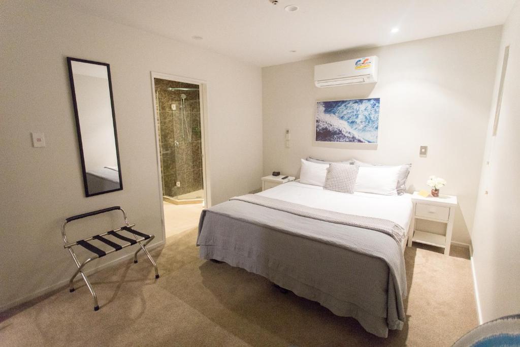 Postel nebo postele na pokoji v ubytování Colombo Lodge Hotel