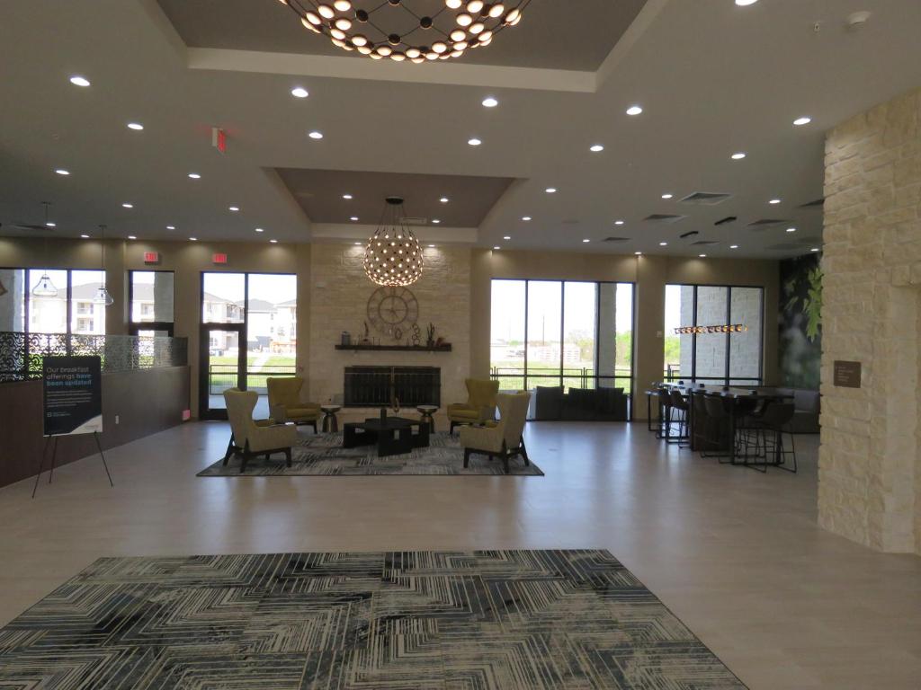 Ein Sitzbereich in der Unterkunft Wyndham Garden College Station