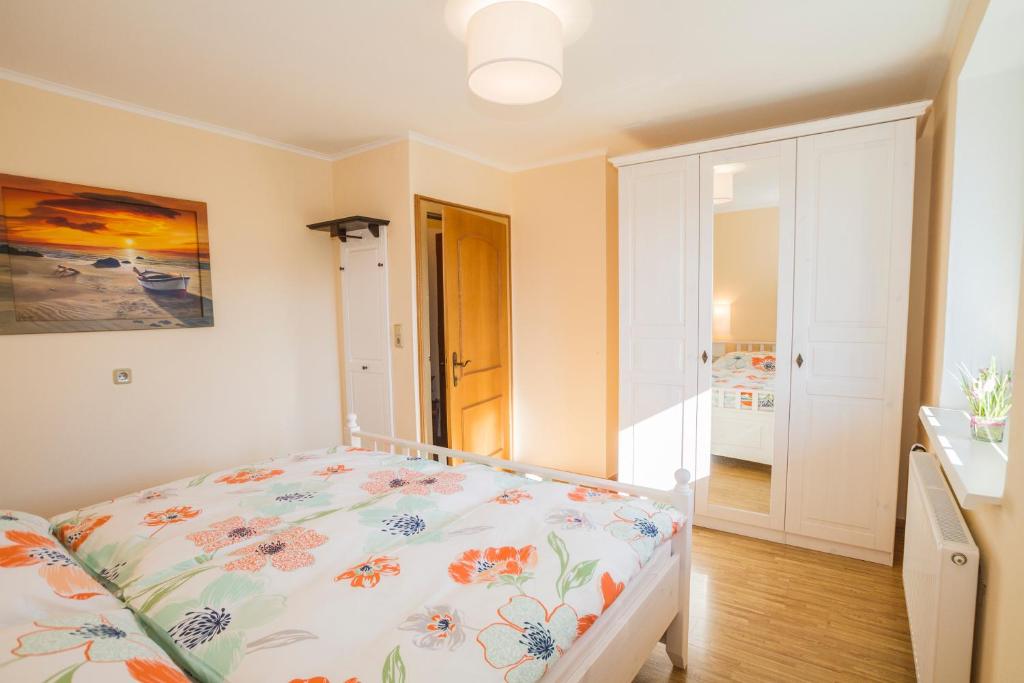 Postel nebo postele na pokoji v ubytování Haus Bergland