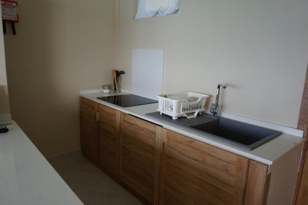 Kuchyň nebo kuchyňský kout v ubytování Maka Bay Self Catering