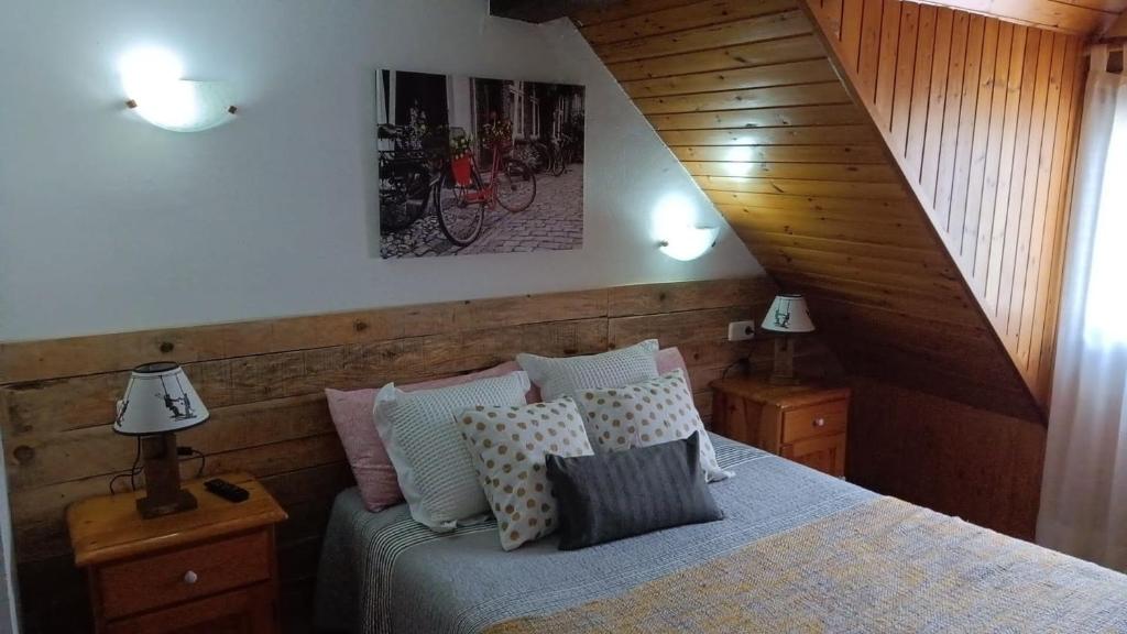 Postel nebo postele na pokoji v ubytování Ço d´Eric