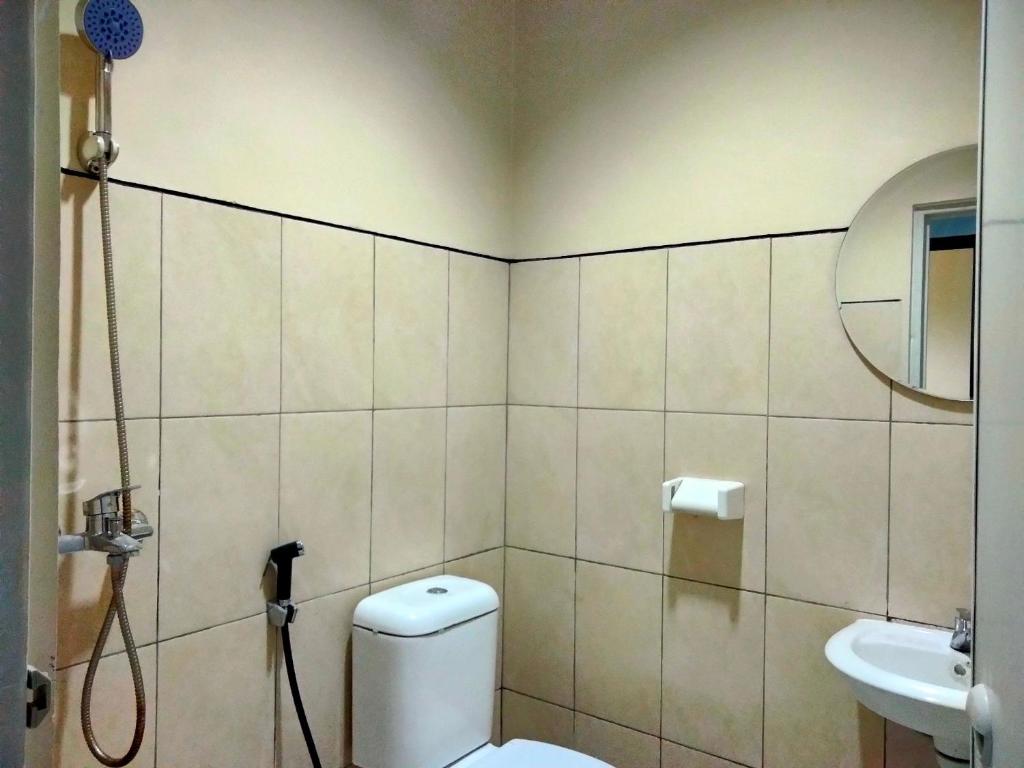 Ванна кімната в Pondok Indah24 Hotel
