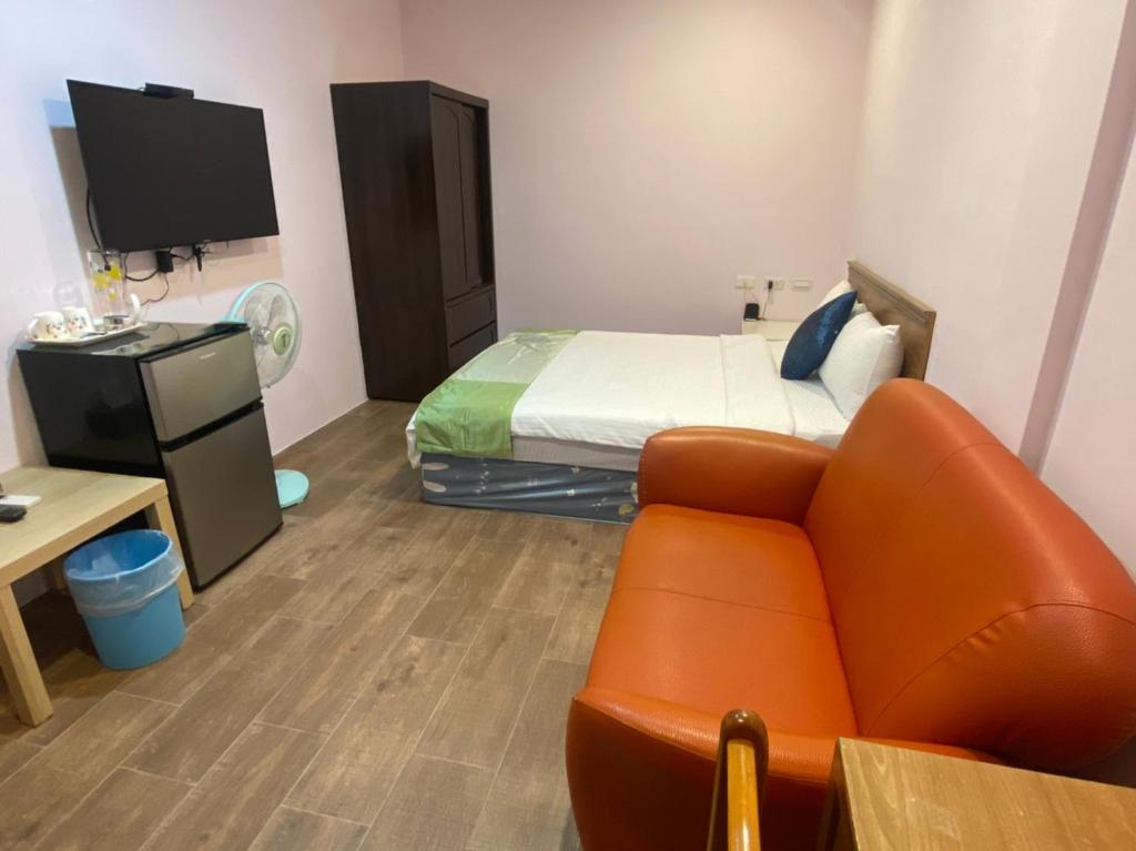 TV a/nebo společenská místnost v ubytování 恆玖民宿 Heng Jiou Homestay