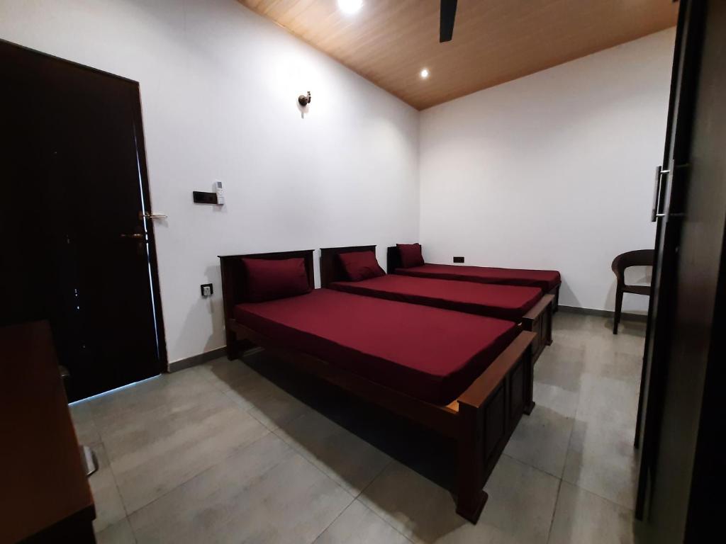 Postel nebo postele na pokoji v ubytování Taj Residence