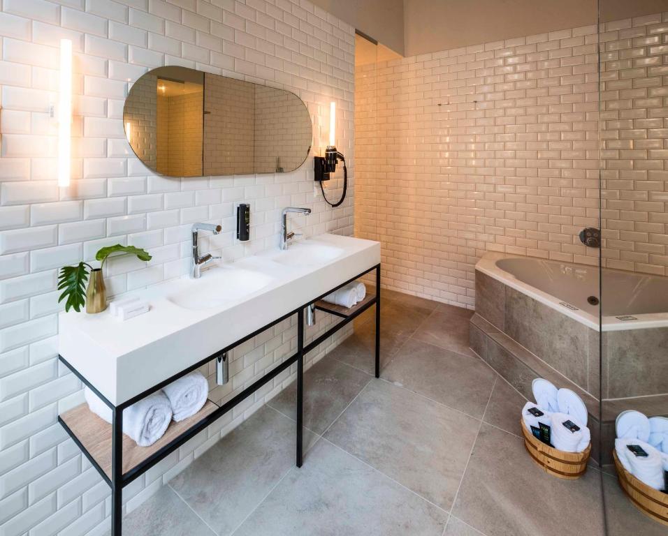 Salle de bains dans l'établissement Hotel Arena
