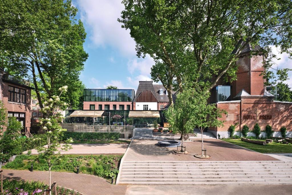 a building with a staircase in front of it at Hotel Arena in Amsterdam