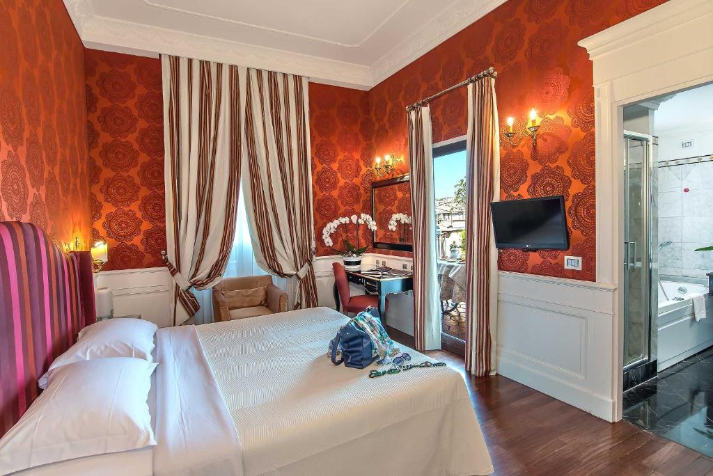 Postel nebo postele na pokoji v ubytování Albergo del Senato