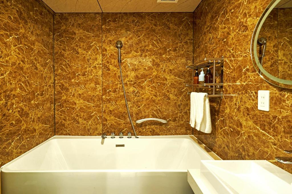 Koupelna v ubytování HOTEL HIMALAYA SEA