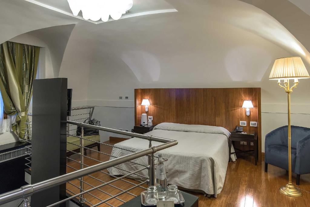 Postel nebo postele na pokoji v ubytování Albergo del Senato