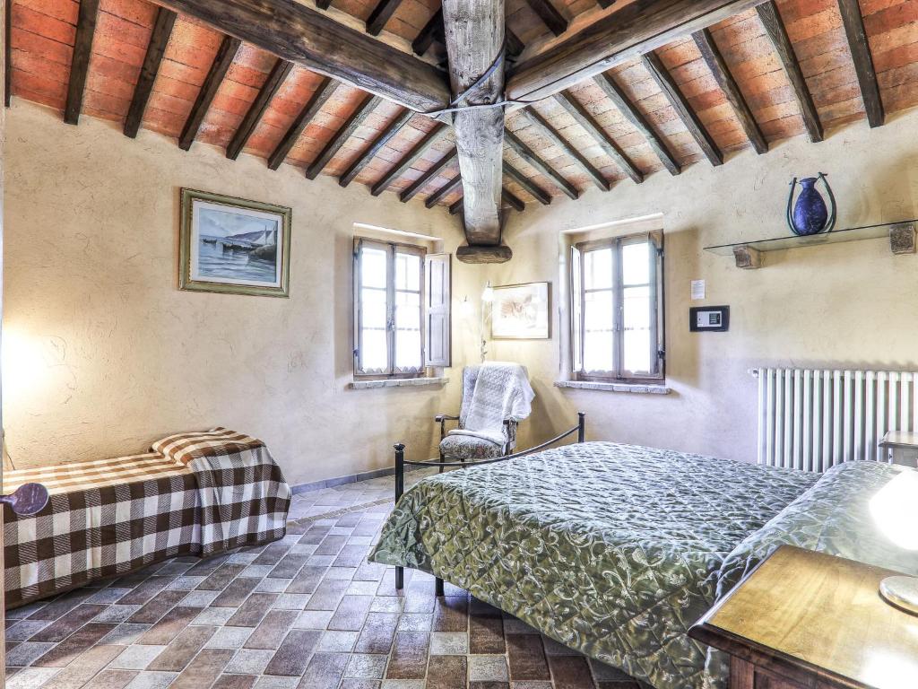 Posteľ alebo postele v izbe v ubytovaní Holiday Home Casale Il Poggino by Interhome