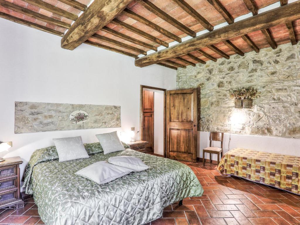 Posteľ alebo postele v izbe v ubytovaní Holiday Home Casale Il Poggino by Interhome