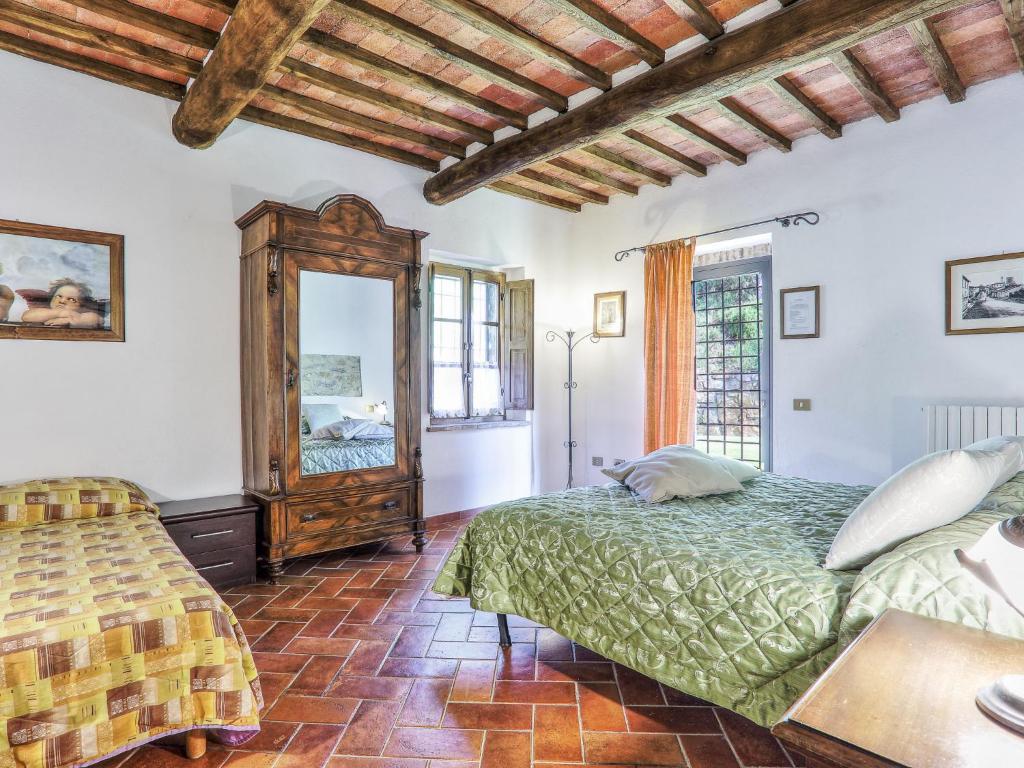 Posteľ alebo postele v izbe v ubytovaní Holiday Home Casale Il Poggino by Interhome
