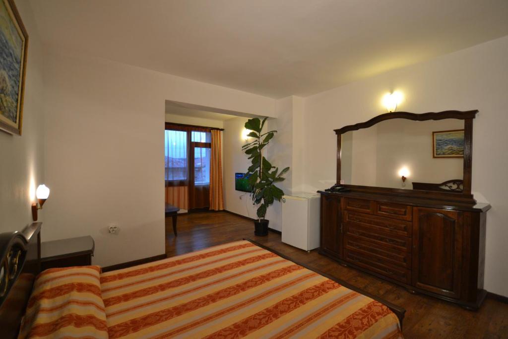 Postel nebo postele na pokoji v ubytování More Family Hotel