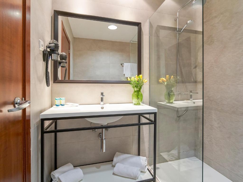 Koupelna v ubytování Hotel Plaza Las Matas
