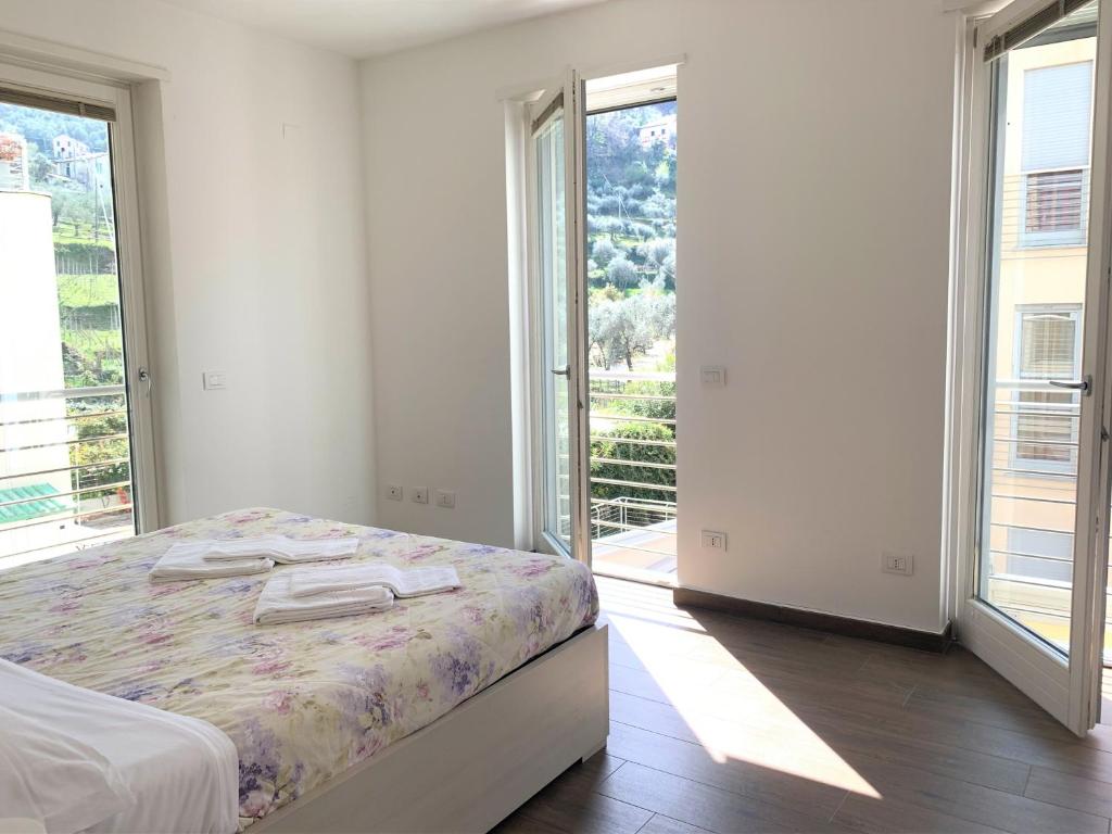 Postel nebo postele na pokoji v ubytování Camere e case vacanza Residenza Prealba