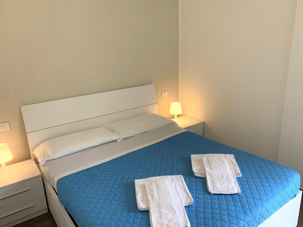 Postel nebo postele na pokoji v ubytování Camere e case vacanza Residenza Prealba