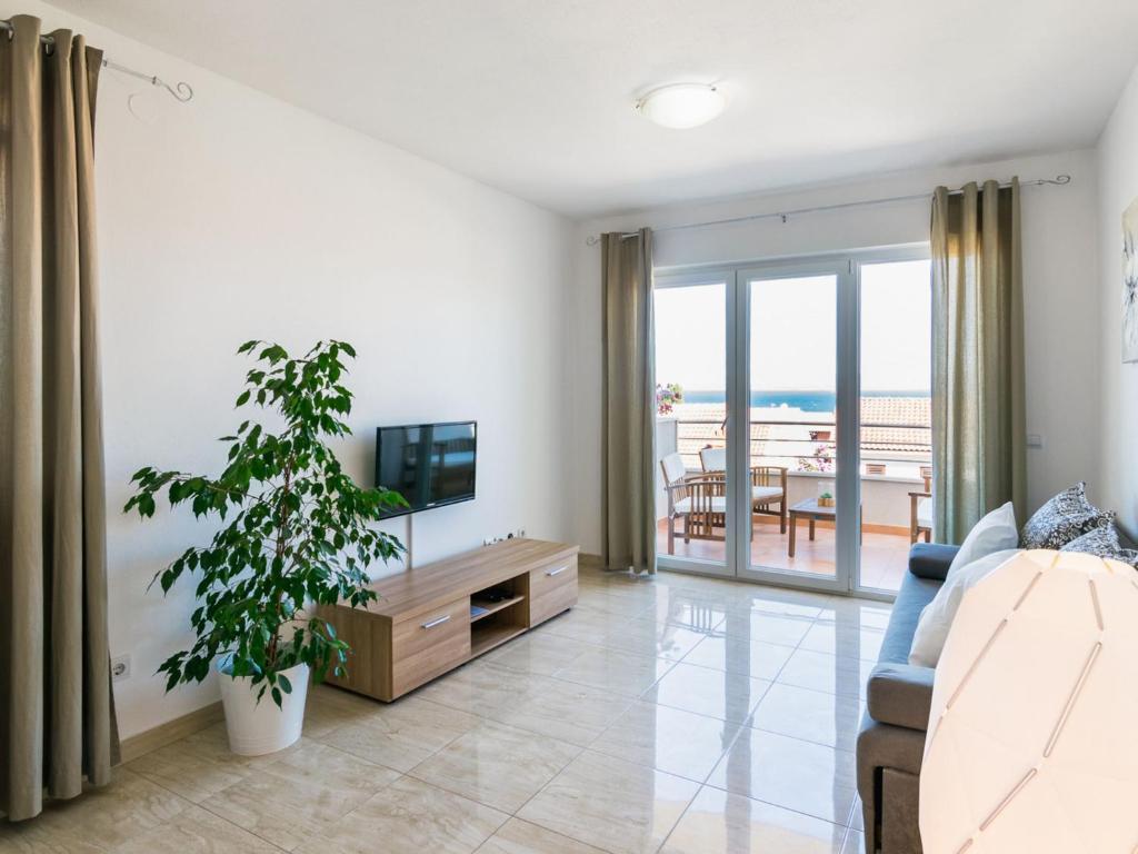 TV a/nebo společenská místnost v ubytování Apartment Villa 2 Pools-4 by Interhome