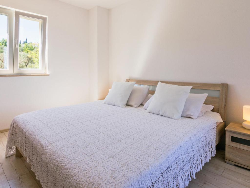 Postel nebo postele na pokoji v ubytování Apartment Villa 2 Pools-4 by Interhome