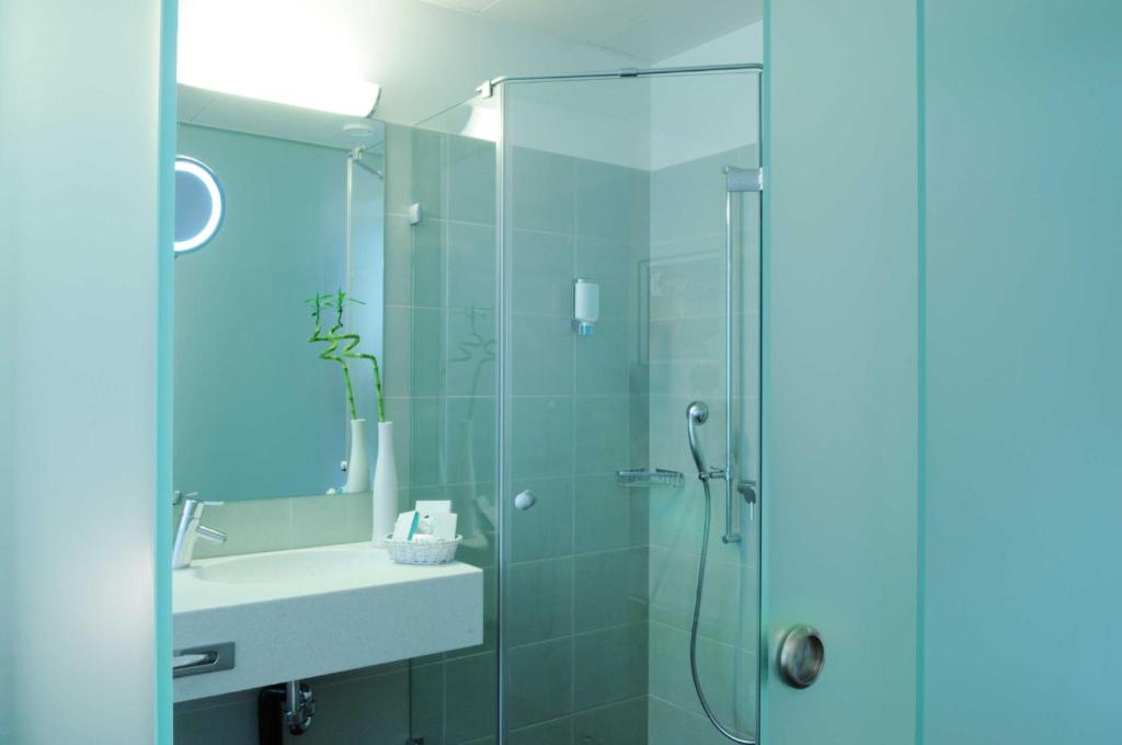 Koupelna v ubytování Sorell Hotel Ador