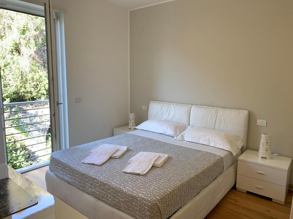 Postel nebo postele na pokoji v ubytování Camere e case vacanza Residenza Prealba