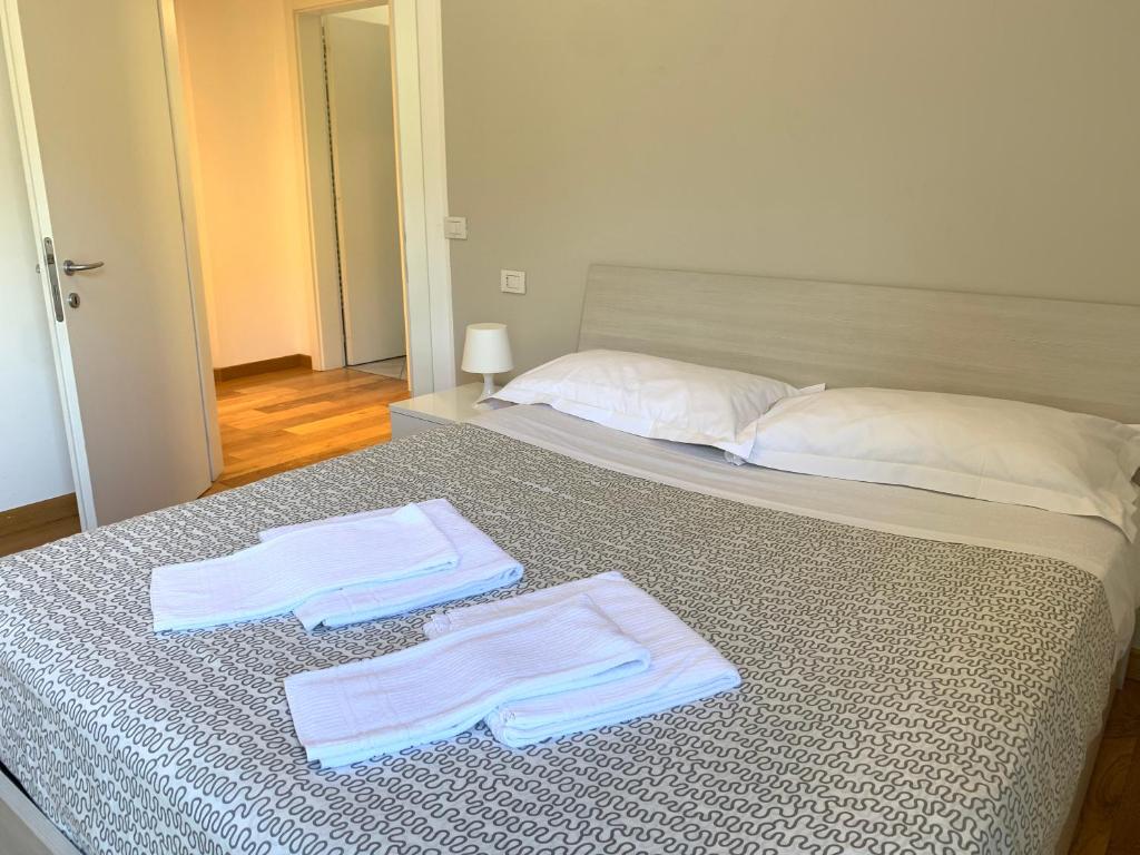 Postel nebo postele na pokoji v ubytování Camere e case vacanza Residenza Prealba