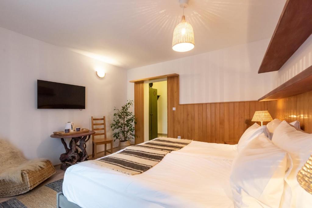 Postel nebo postele na pokoji v ubytování Rocker's Inn
