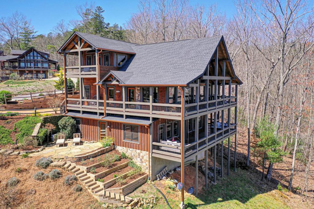 a large wooden house with a gambrel roof at The Nest in Blue Ridge