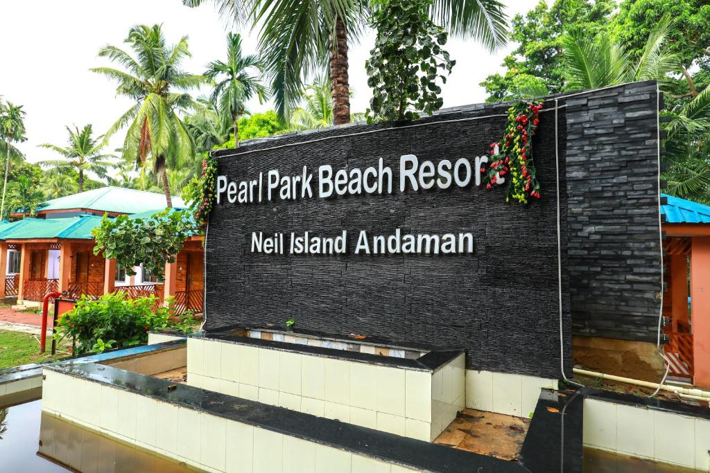 ein Schild für ein Strandresort in einem Resort in der Unterkunft Pearl Park Beach Resort Private Limited in Port Blair
